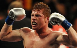 Saul Alvarez of Mexico celebrates after knocking out opponent Carlos Baldomir of Argentina during their WBC Super Welterweight Silver Title fight at the Staples Center in Los Angeles, on September 18, 2010.               AFP PHOTO/Mark RALSTON (Photo credit should read MARK RALSTON/AFP/Getty Images)
